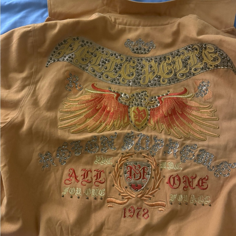 3X retro coat I would say the color is tan and gold. Very excellent condition